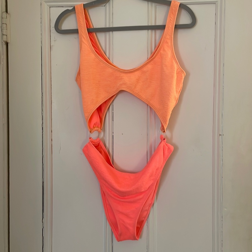 brand new! Reef cut out one piece